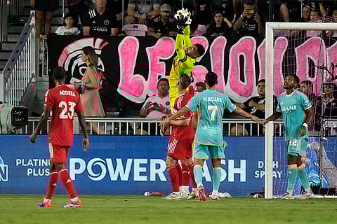 Inter Miami goalkeeper Drake Callender makes a save